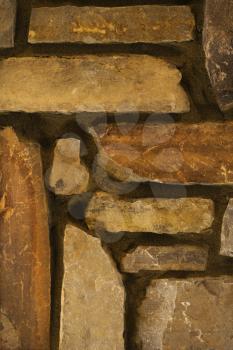Royalty Free Photo of a Close-up Detail of a Stone Wall in a Home