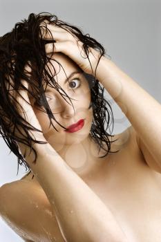 Royalty Free Photo of a Woman Holding Wet Hair