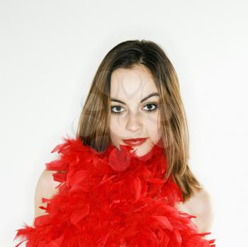 Royalty Free Photo of a Pretty  Woman With a Red Feather Boa Smiling
