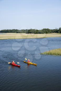 Royalty Free Photo of Two Teenage Boys Kayaking on Bald Head Island, North Carolina