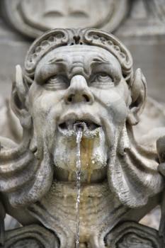 Royalty Free Photo of a Statue Fountain in Rome, Italy