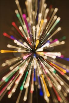 Royalty Free Photo of an Abstract Christmas Tree With Motion Blurred Multicolored Lights in a Radial Star-burst Pattern