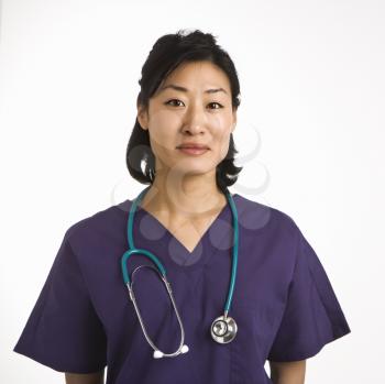 Asian woman doctor head and shoulder portrait against white background.
