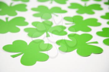 Royalty Free Photo of a Group of Green Paper Shamrocks