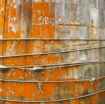 Royalty Free Photo of a Round Structure With Peeling Orange Paint