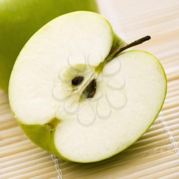 Close up of sliced green apple.