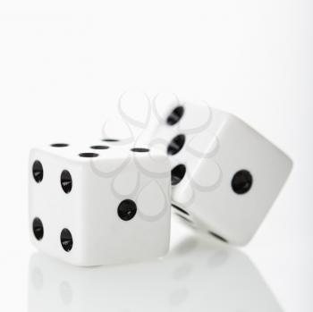 Two white dice. 