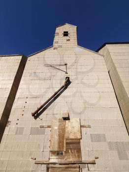 Royalty Free Photo of an Abandoned Metal Grain Elevator
