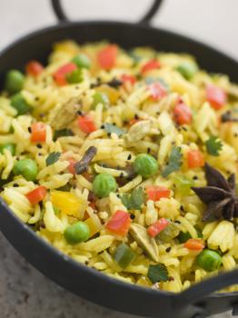 Royalty Free Photo of a Vegetable Pilau Rice in a Balti Dish