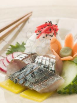 Royalty Free Photo of Sashimi of Mackerel With Pickled Daikon Salad and Vinegar Rice