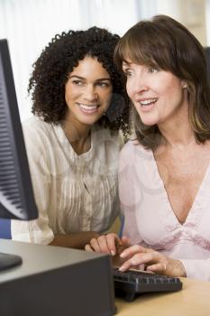 Royalty Free Photo of Two Women at a Computer