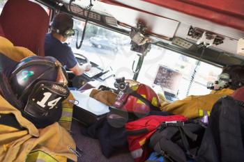 Royalty Free Photo of Firefighters in the Truck