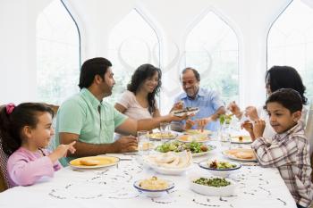 Royalty Free Photo of a Family at a Dinner Table