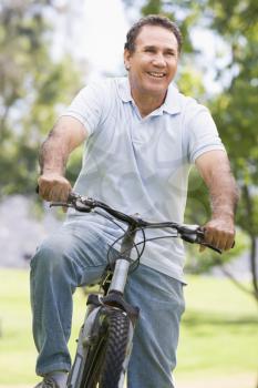 Royalty Free Photo of a Man on a Bike