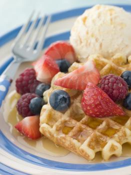 Royalty Free Photo of Sweet Waffles With Berries, Ice Cream and Syrup