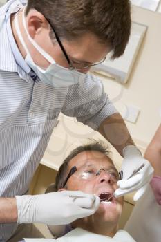 Royalty Free Photo of a Dentist and Patient