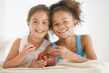 Royalty Free Photo of Two Girls With Strawberries