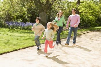 Royalty Free Photo of a Family Walking Outside