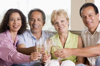 Royalty Free Photo of Couples Drinking Champagne