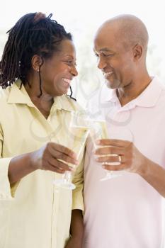 Royalty Free Photo of a Couple With Champagne