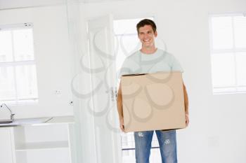 Royalty Free Photo of a Man Moving Into a New Home