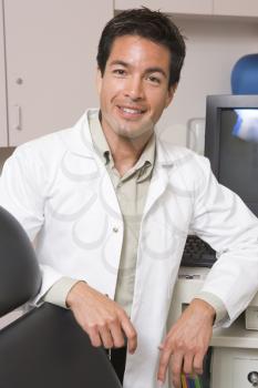 Royalty Free Photo of a Doctor Beside a Computer