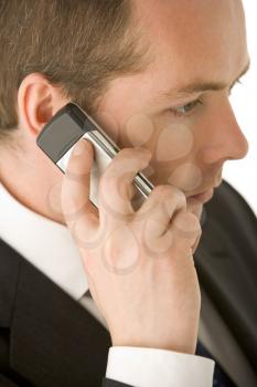 Royalty Free Photo of a Man Talking on a Cellphone