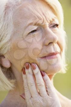 Royalty Free Photo of a Woman With a Toothache