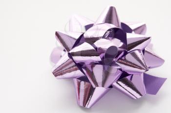 Royalty Free Photo of a Purple Gift Bow