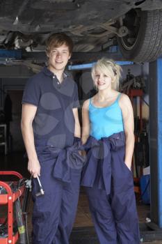 Royalty Free Photo of a Mechanic and Apprentice