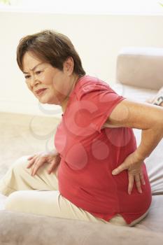 Royalty Free Photo of a Woman With a Sore Back