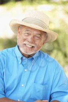 Royalty Free Photo of a Man in a Straw Hat