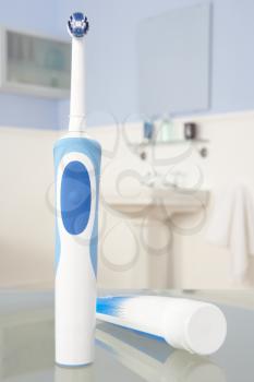 Electric toothbrush and toothpaste