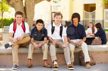 Male High School Students Hanging Out On School Campus