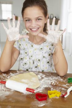 Young girl baking