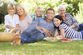 Family with picnic in park