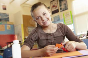 Pre teen girl in art and craft class