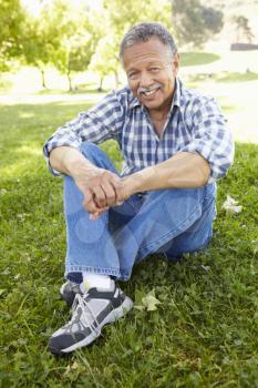 Senior  man sitting in park