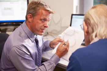 Doctor Discussing Test Results With Senior Male Patient