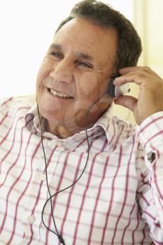 Senior Hispanic Man Wearing Headphones 