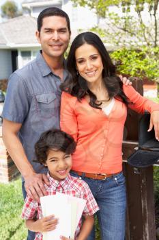 Hispanic Family Checking Mailbox