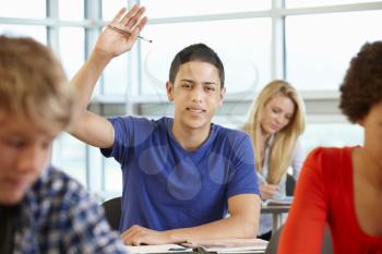 Hispanic student asking question in class