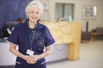 Portrait Of Female Nurse In Hospital Reception