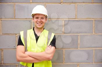 Portrait Of Male Construction Worker On Building Site