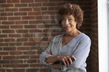 Head And Shoulders Portrait Of Mature Businesswoman