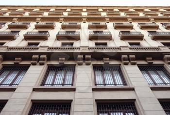 Low angle view of a tall early 20th century building, Barcelona, Spain