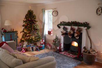 Lounge Decorated For Christmas With Tree And Presents