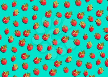 Graphic Background Pattern Of Strawberries Against Green Background