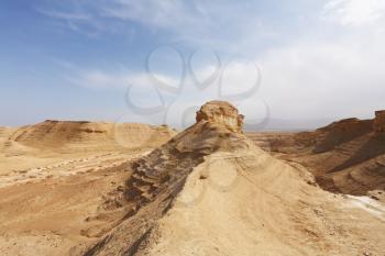 Natural canyons, cliffs and sandstone rock in the desert near the Dead Sea in Israel