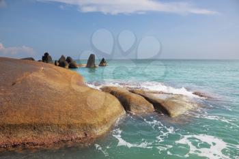 Picturesque cliffs adorn Lamai beach on Koh Samui